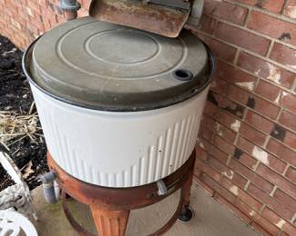 Various larger crocks, vintage washing basin, bird baths