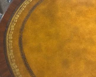 Maitland-Smith Regency Style inlayed Mahogony oval partners desk with pristine hand tooled leather writing surface.                                                                                                          28" H 63 1/2" W X 26" D          