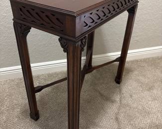 Maitland Smith Chippendale-style mahogany side tea table. Carved fretwork apron and straight legs.   