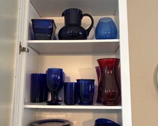 Cobalt Blue dishware plates, bowls, glasses and stemware.