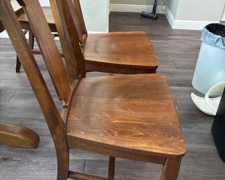 Solid Wood Distressed Pedestal dining table with 6 chairs  31” H x 45” D
27” at tall at apron
Has one leaf to that extend stable to 52" and two armchairs