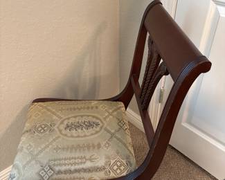 Duncan Phyfe inspired-empire style mahogany lyre-back chair with patterned upholstered seat.