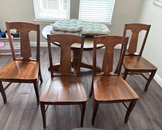 Solid Wood Distressed Pedestal dining table with 6 chairs  31” H x 45” D
27” at tall at apron
Has one leaf to that extend stable to 52" and two armchairs