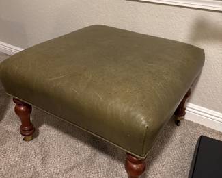Green leather ottoman