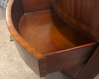 Maitland-Smith Regency Style inlayed Mahogany oval  desk with pristine hand tooled leather writing surface.                                                                                                          28" H 63 1/2" W X 26" D                   empire, neoclassical    