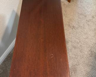 Maitland Smith Chippendale-style mahogany side tea table. Carved fretwork apron and straight legs.   27" x 12 1/2" x 27 1/2" H