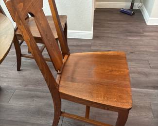 Solid Wood Distressed Pedestal dining table with 6 chairs  31” H x 45” D
27” at tall at apron
Has one leaf to that extend stable to 52" and two armchairs