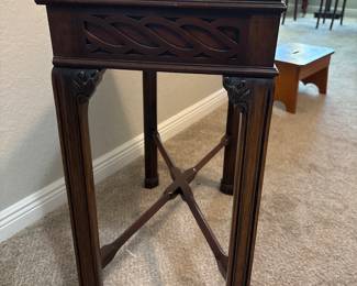 Maitland Smith Chippendale-style mahogany side tea table. Carved fretwork apron and straight legs.   27" x 12 1/2" x 27 1/2" H