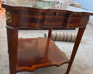 Maitland-Smith McKinley mahogany occasional accent side table serpentine shape with aged regency finish one drawer and three pull outs. 24" X 24" X 26" high.