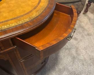 Maitland-Smith Regency Style inlayed Mahogony oval partners desk with hand tooled leather writing surface.                                                                                                          28" H 63 1/2" W X 26" D           empire, neoclassical    