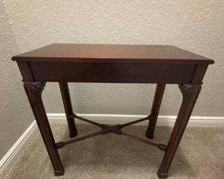 Maitland Smith Chippendale-style mahogany side tea table. Carved fretwork apron and straight legs.   27" x 12 1/2" x 27 1/2" H  