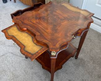 Maitland-Smith McKinley mahogany occasional accent side table serpentine shape with aged regency finish one drawer and three pull outs. 24" X 24" X 26" high.