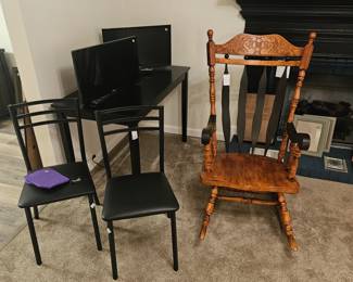 chairs table rocker and TV's