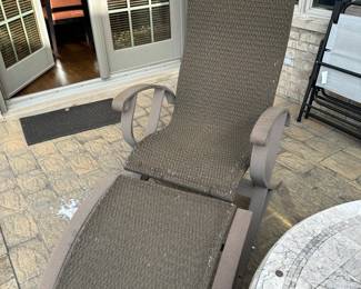 Wicker outdoor chair with ottoman