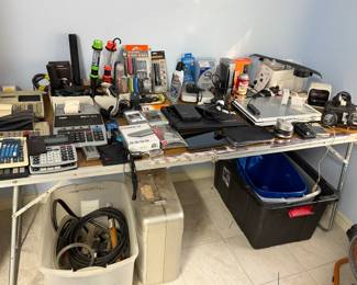 Office supplies and items - calculators, laptops, modems, etc