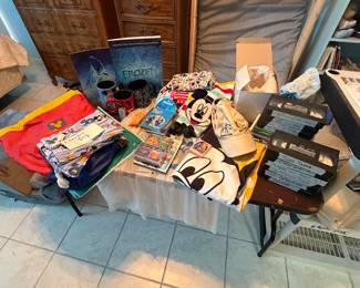Various Disney movies and collectibles