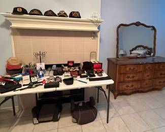 Watches, billfolds, Vietnam Veteran hats, glasses and many more items.  