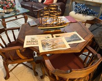 Gaming table with decorative ship