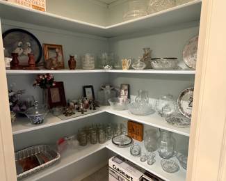 Lots of knick knacks and beautiful bowls.  Canning jars and miniatures