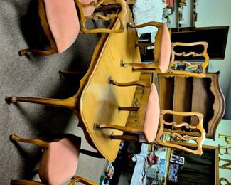 7 pcs. French Provincial "Orleans Collection" walnut dining room table set w/ 3 leaves and pads