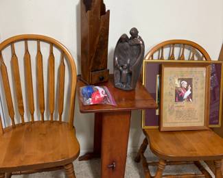 There are four of the solid wood dinette chairs