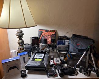 Vintage cameras, Sony Playstaton controller and camcorders