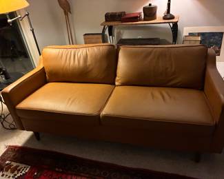 42 250.00 Caramel leatherette Sofa 70Wx31Dx32H with slight damage