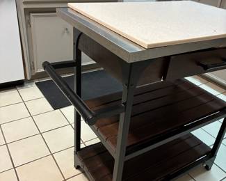 31 90.00 Kitchen island 32x19x34 with stainless top & drawer