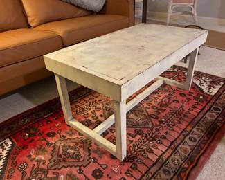 49 50.00 Cream distressed table 36x20x18