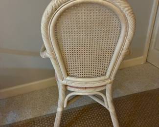 47 220.00 Set of 6 white wicker chairs.