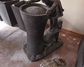 Boy/Girl water fountain Yard art