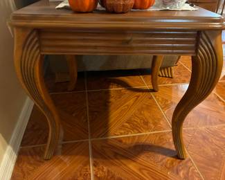2 End tables that match the couches.  1 in good condition, 1 has damage on the top