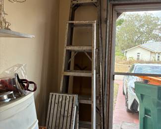 2 large ladders, 