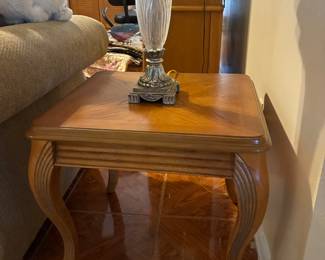 2 End tables that match the couches.  1 in good condition, 1 has damage on the top