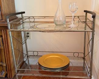 Tea cart with decorative glass shelves 