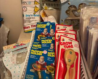 Pacifier holders and brush and comb sets