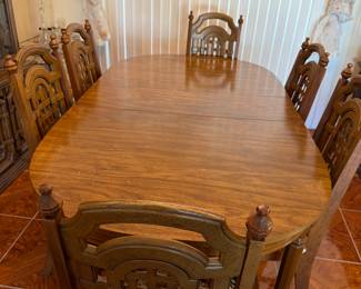 MCM dining room table with 3 leaves.  Includes 6 chairs 