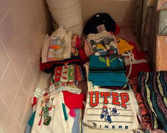 Sailor hats, ball caps and infant outfits 