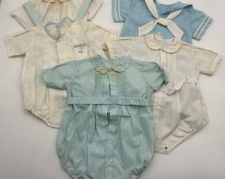 Collection of five vintage pastel colored baby rompers.