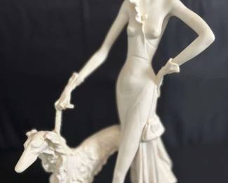 A. Santini Art Deco composite sculpture of a woman with a Borzoi dog 