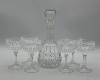 Set of crystal wine glasses and a crystal decanter