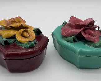 Vintage California pottery trinket boxes with applied rose decorations.