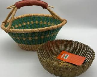 A vintage woven brass basket with a decorative edge, originating from India and a handwoven basket 