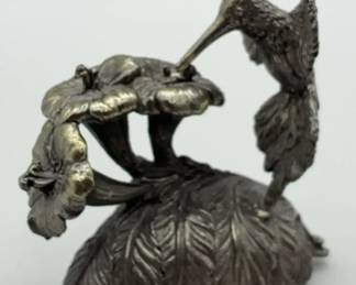Neman Marcus Pewter music box featuring a hummingbird and flower.