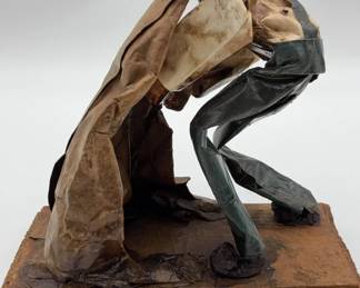 Vintage Mexican paper mache folk art figurine of a worker.