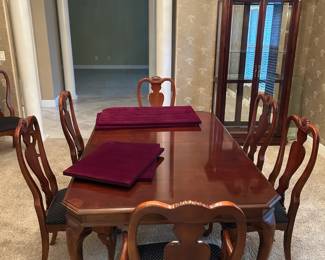 wood dining table and 6 matching chairs