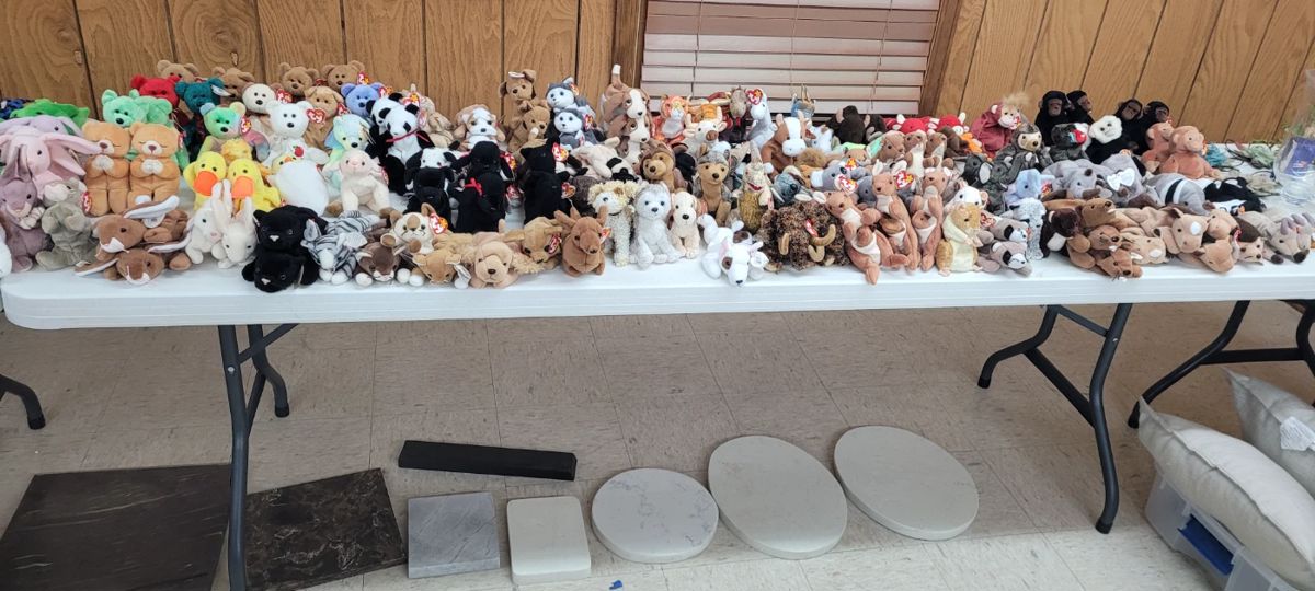 Over 400 Beanie Babies, some with misprints.