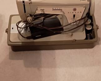 Vintage Singer sewing machine with case