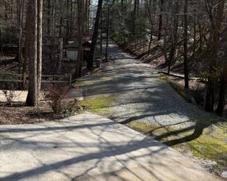 You may park on either side of the driveway, but Please be respectful of the owners, their neighbors and your fellow shoppers.