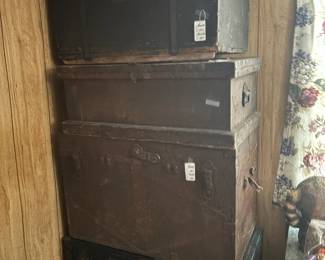 different size wood & metal trunks